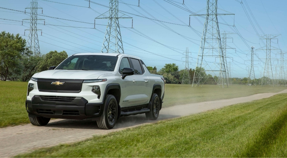 A white 2024 Chevy Silverado EV WT is shown after visiting a Tennessee Chevy dealer.