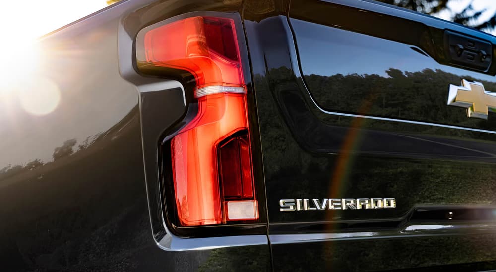 Brake light and back of a black 2026 Chevy Silverado 2500HD