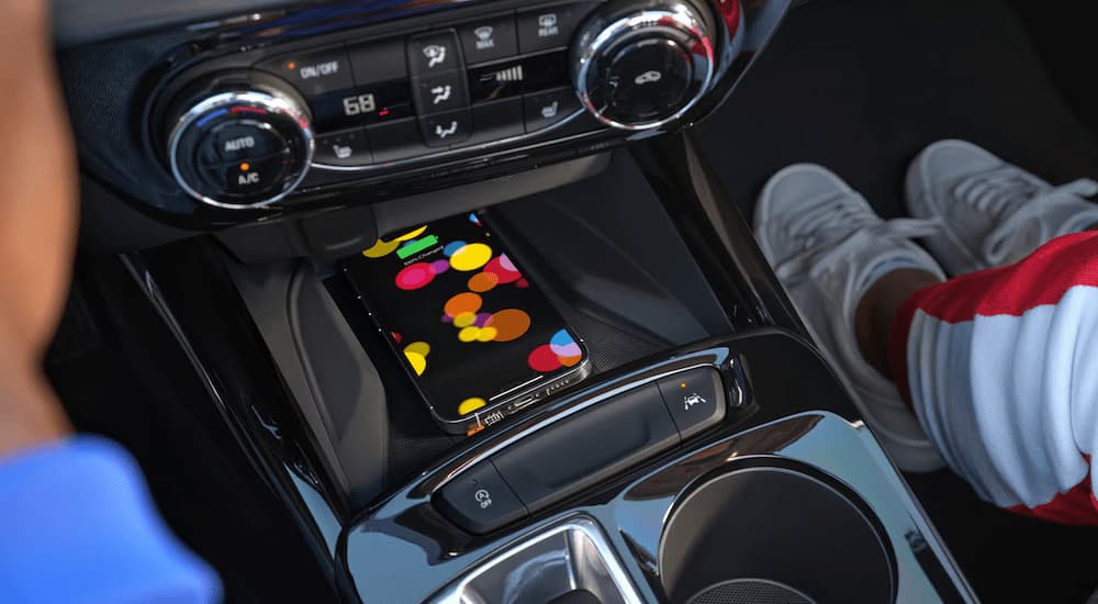 Phone in the center console in a 2026 Chevy Trax RS