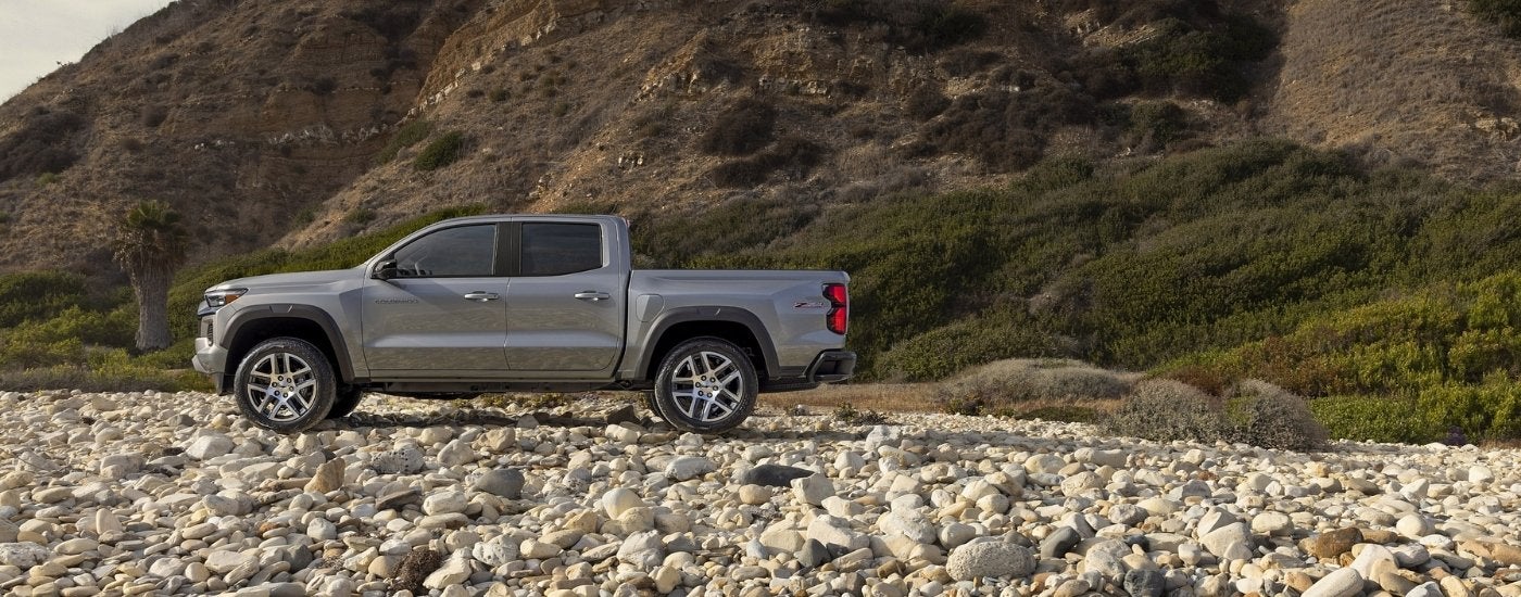 A silver 2026 Chevy Colorado from the side.