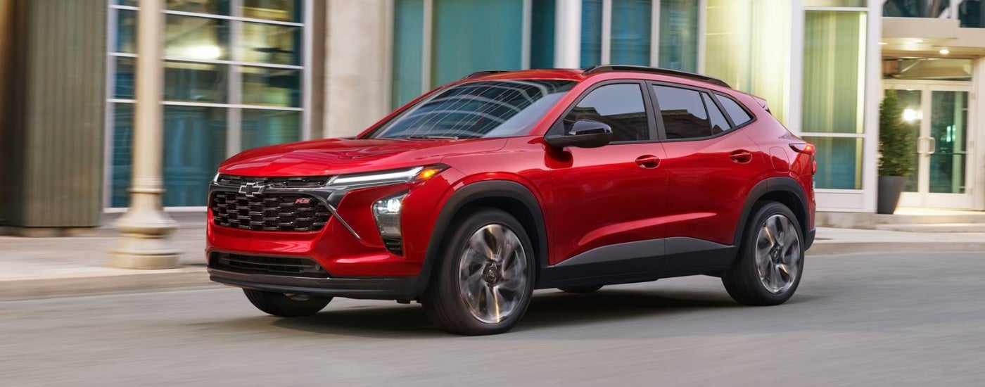 Red 2026 Chevy Trax RS driving to a Chevy dealer near Southaven