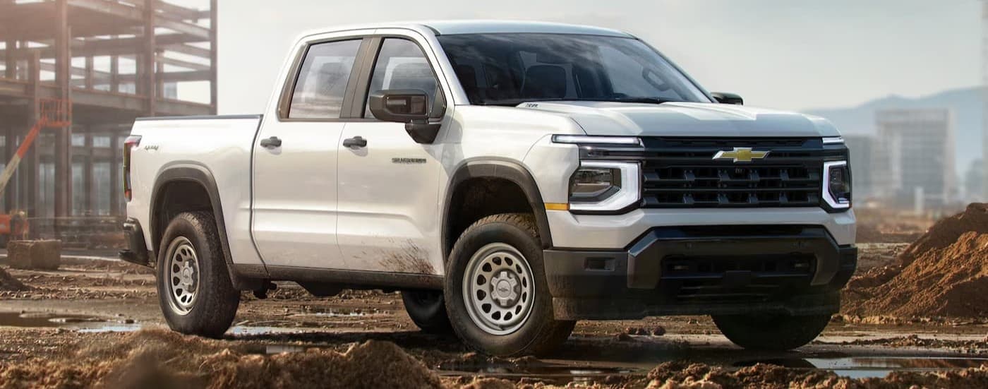 A white 2027 Chevy Silverado 1500 parked offroad.