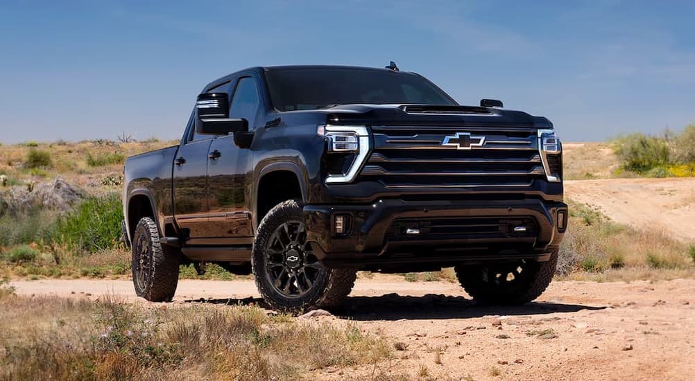 A black 2026 Chevy Silverado 2500 parked offroad.