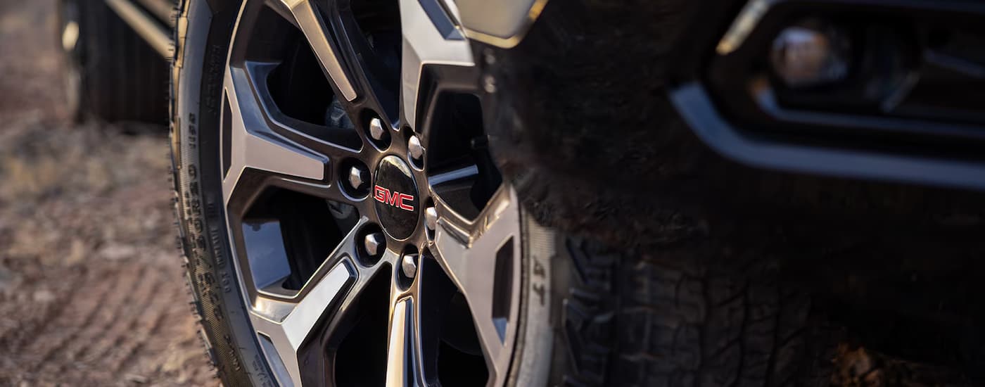 Close up of the tire and rim on a 2025 GMC Yukon